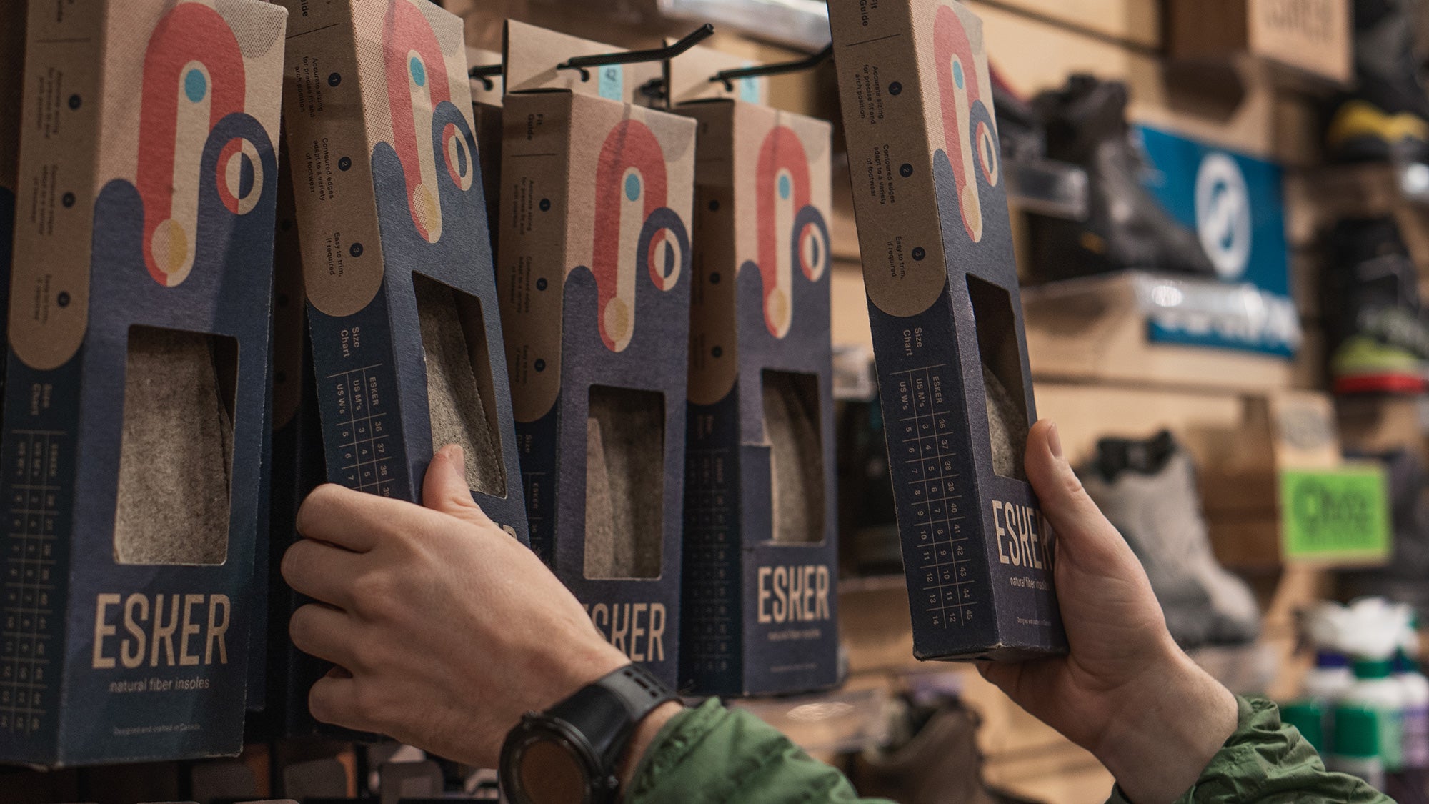 Esker insoles boxes on the wall at a retailer